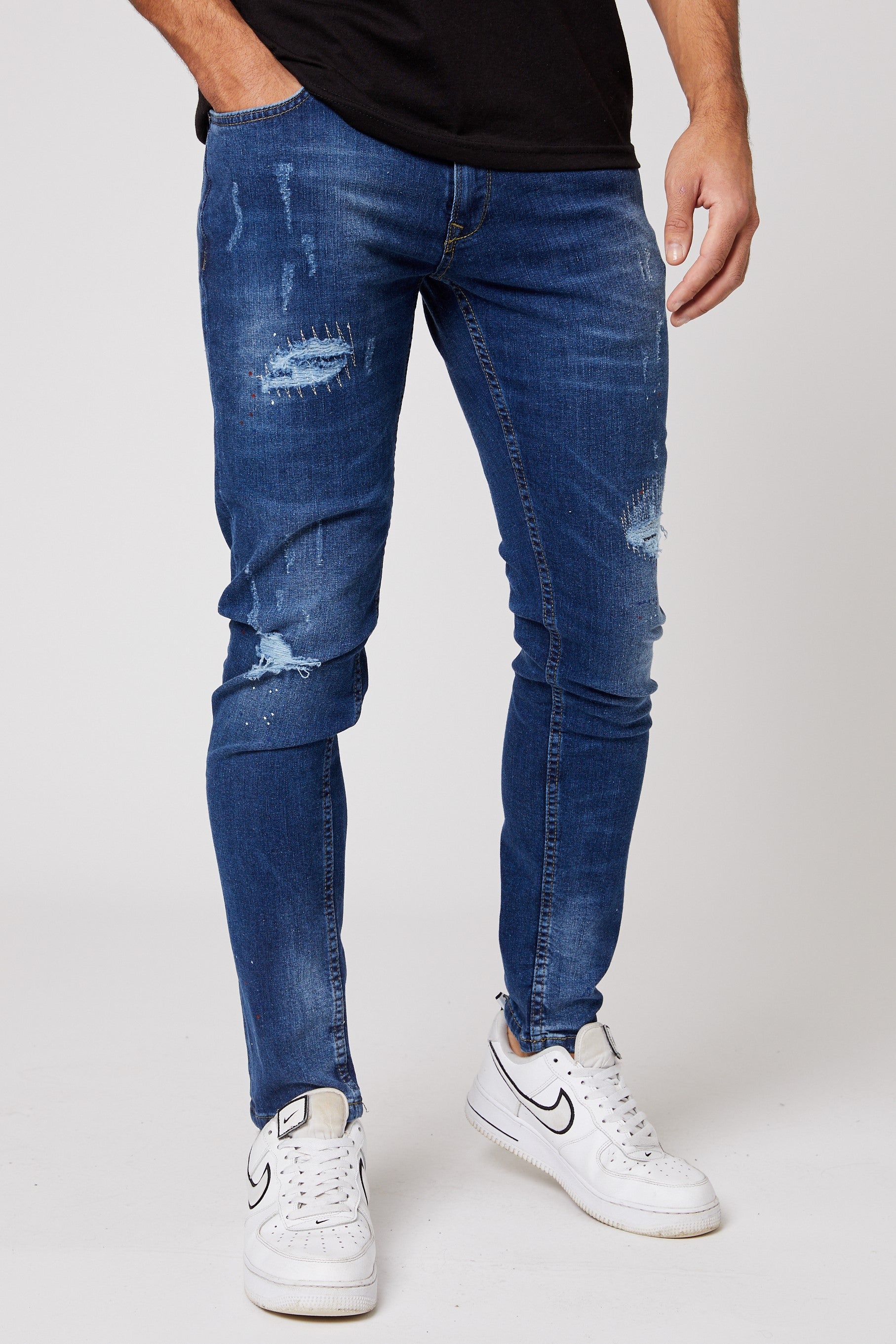 Dark green ripped jeans sales